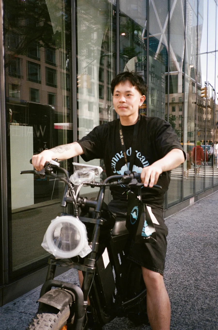 Cannadreams weed delivery driver on an e-bike in Manhattan