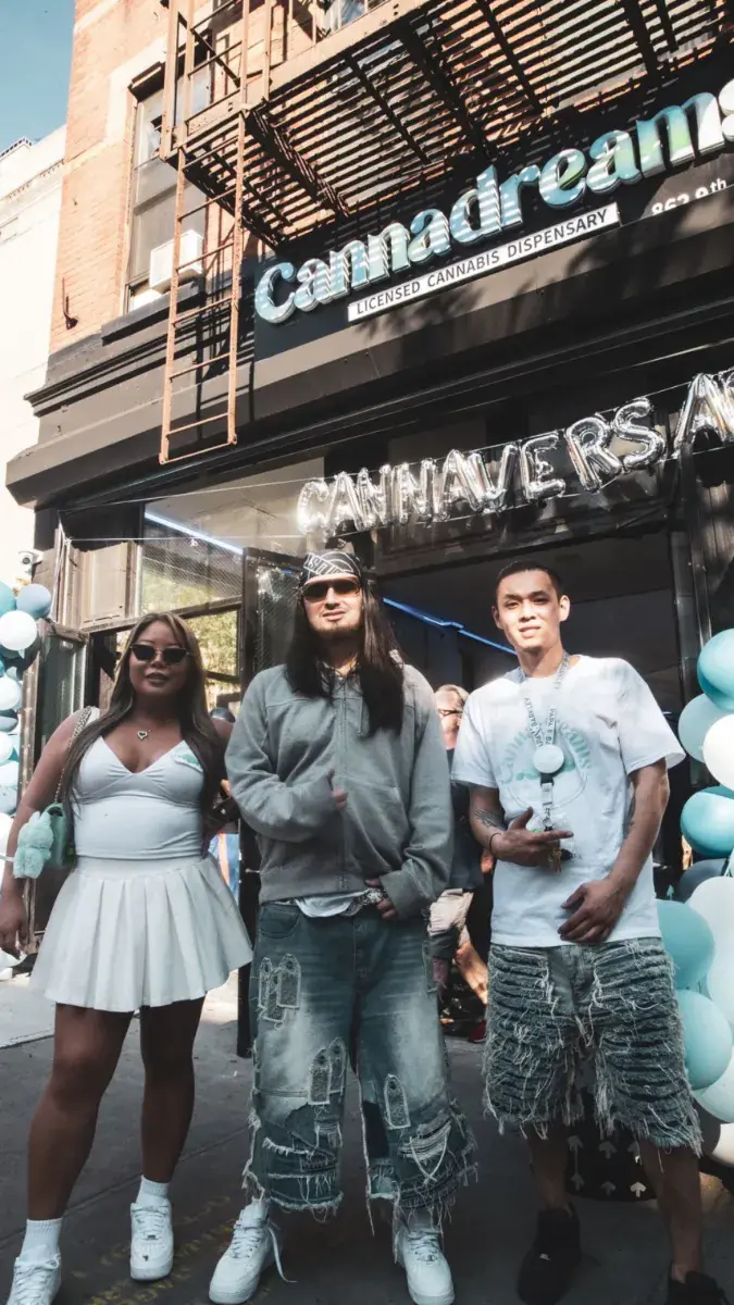 Artist B-Jacks celebrating Cannadreams' 1 year anniversary outside the Hell's Kitchen shop