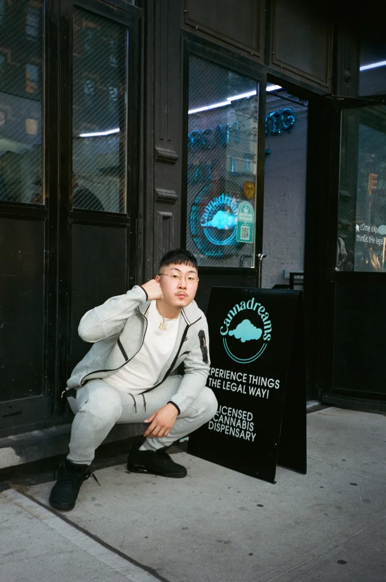Elmjosae, an underground artist from Queens, NY, outside the Cannadreams Hell's Kitchen shop